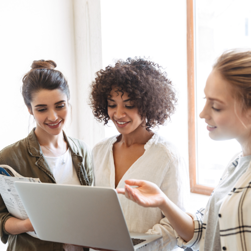 A group of women working together in an office